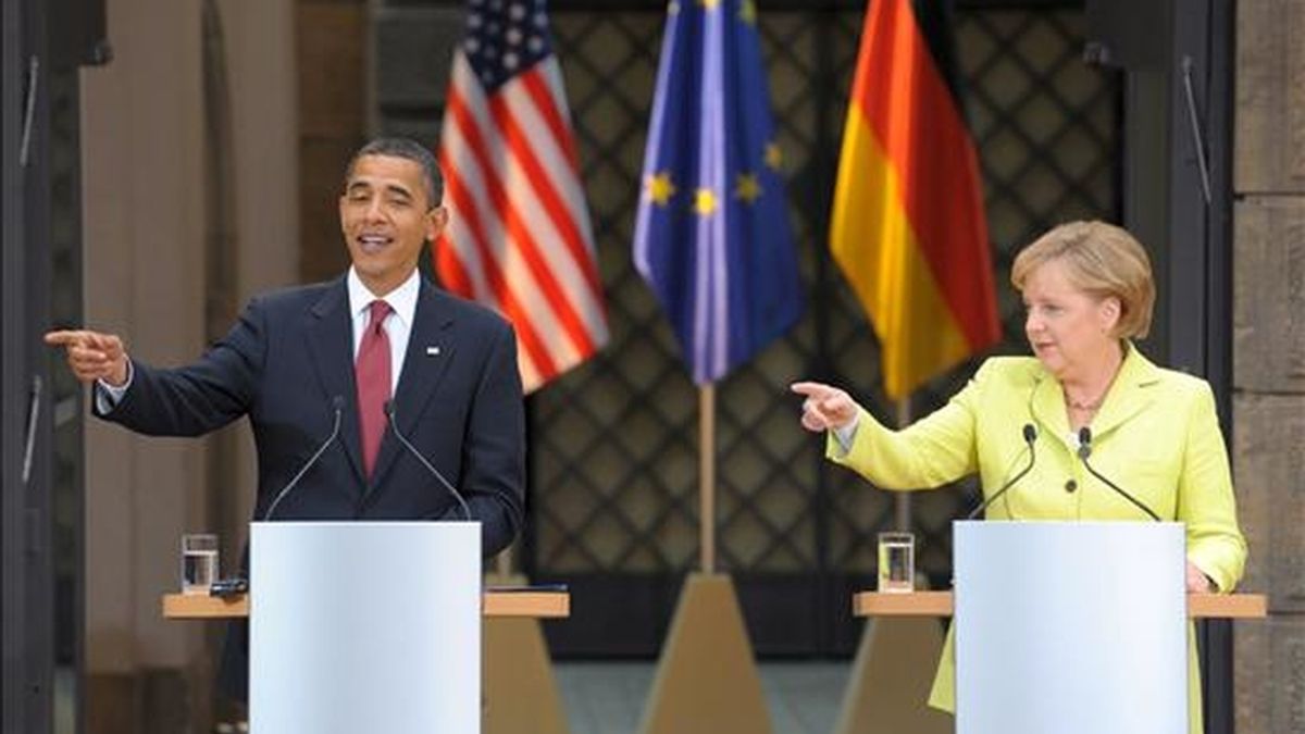 El presidente de Estados Unidos, Barack Obama (izq), ofrece una rueda de prensa junto a la canciller alemana, Ángela Merkel, tras su encuentro en Dresden, Alemania, el pasado 5 de junio. EFE/Archivo