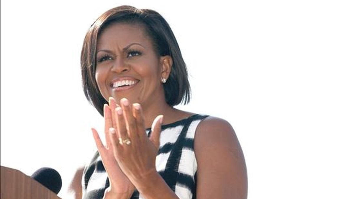 Michelle Obama agradeció la labor de los trabajadores del astillero y afirmó que "sean ustedes soldadores o mecánicos, sea cual sea su oficio, este barco también es un tributo a ustedes y a sus familias". EFE/Archivo
