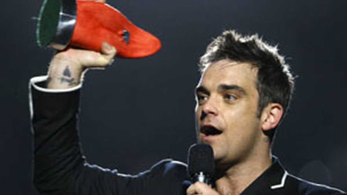 Robbie Williams ha sido interrogado en relación con un asalto sufrido por unos paparazzi que le hicieron unas fotos en Bahamas. Foto archivo