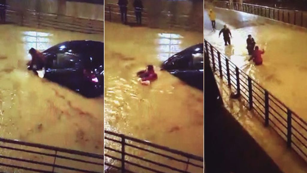 Salta in extremis por la ventana del coche tras quedar atrapada en las inundaciones