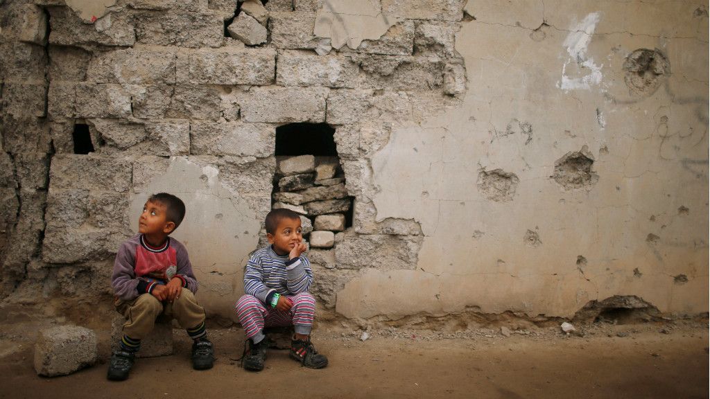 En la puerta de casa, en Mosul (Irak)