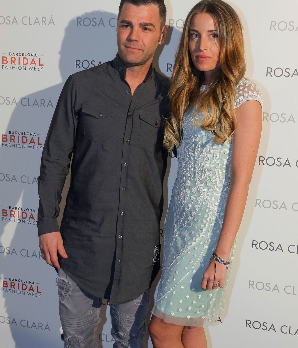 Marta Castro y Fonsi Nieto en el desfile de Rosa Clará