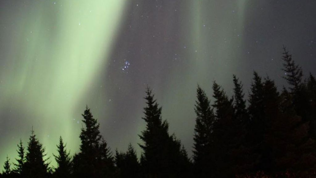 Fotos: Reykjávik apaga por primera vez sus luces para admirar las auroras boreales