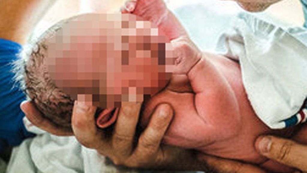 Da a luz en un portal de Madrid...a un bebé de tres kilos