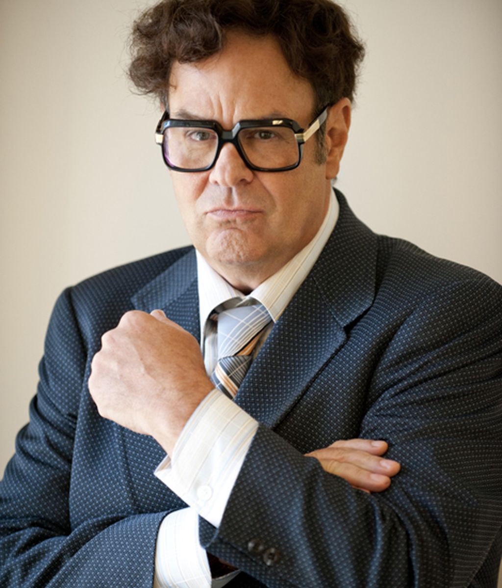 Dan Aykroyd es Seymour Heller