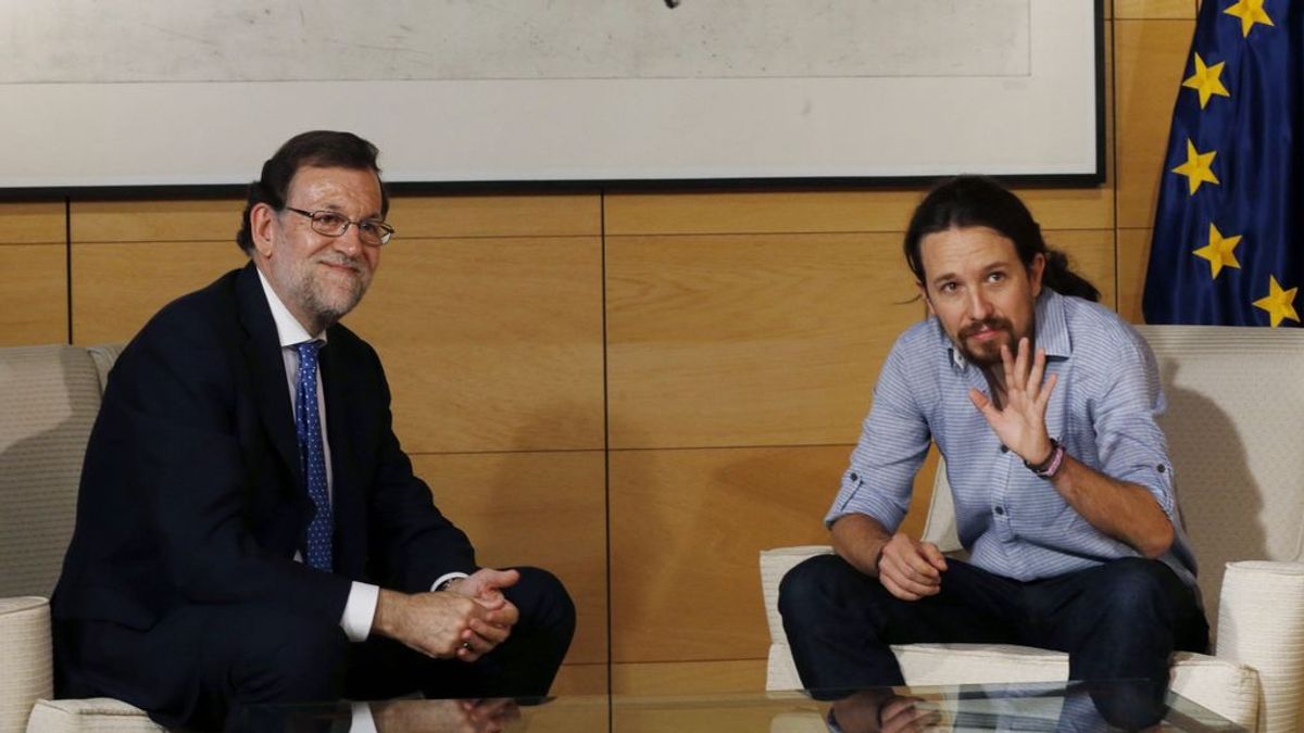 Rajoy dice a Iglesias que no puede dialogar con Puigdemont si no renuncia a la DUI