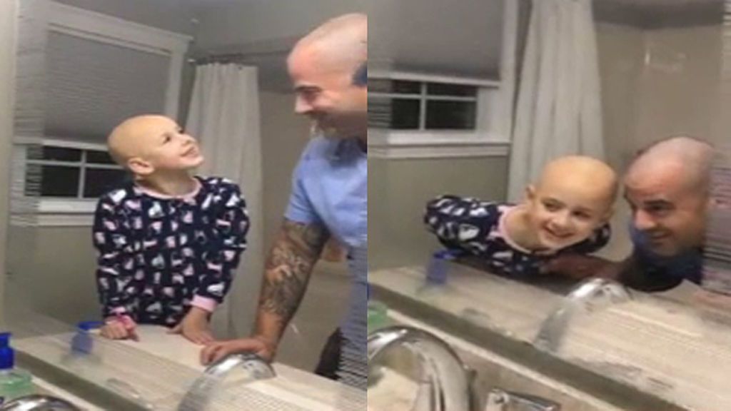 El tierno momento en el que un padre se rapa al cero para animar a su hija con alopecia