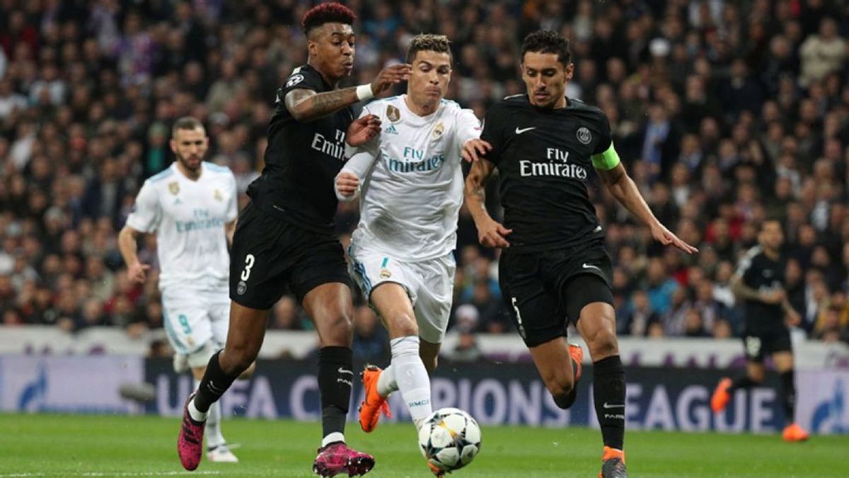 Presnel Kimpembe, Cristiano Ronaldo y Marquinhos, en el encuentro de ida de los octavos de final de la Champions League 2017/2018 entre Real Madrid y Paris Saint-Germain.
