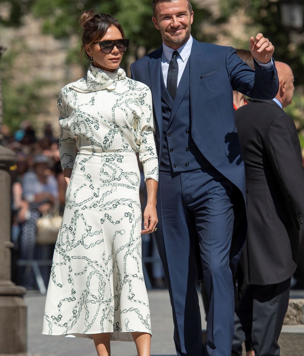 El exfutbolista David Beckham, junto a su mujer Victoria, a su llegada a la Catedral de Sevilla