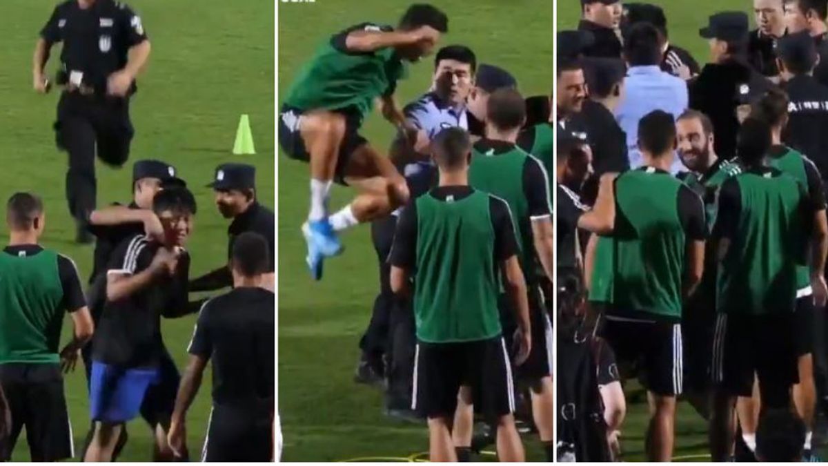 Un chico invade el entrenamiento de la Juve, la policía va a por él y Cristiano se tira encima de un miembro de seguridad Un chico invade el entrenamiento de la Juve, la policía va a por él y Cristiano se tira encima de un miembro de seguridad
