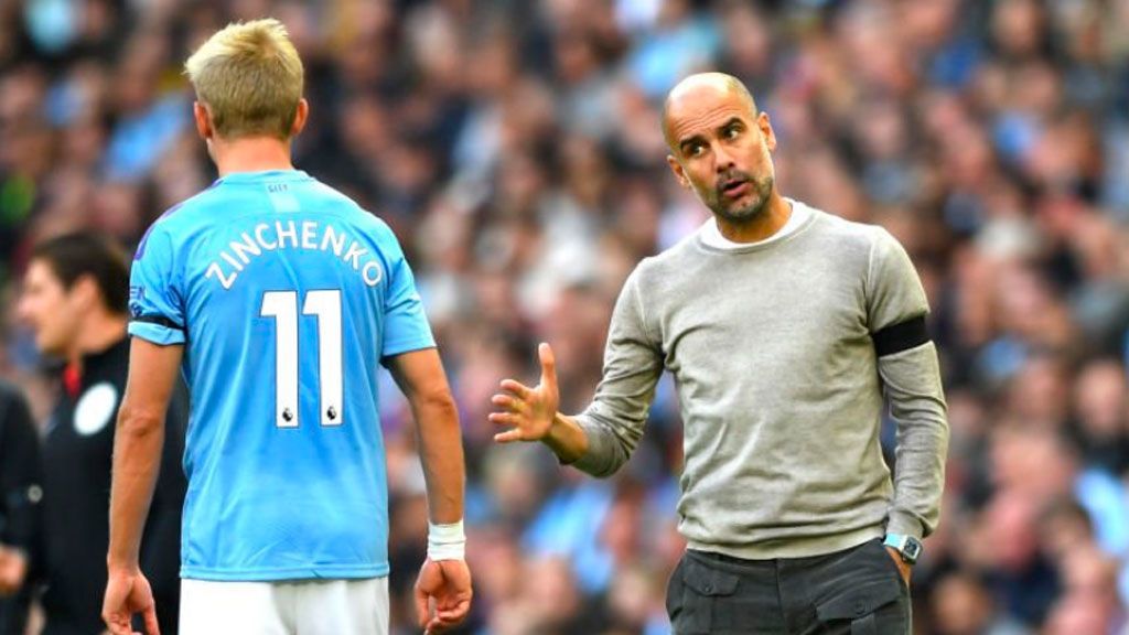 Guardiola y los jugadores del Manchester City lucen un ...