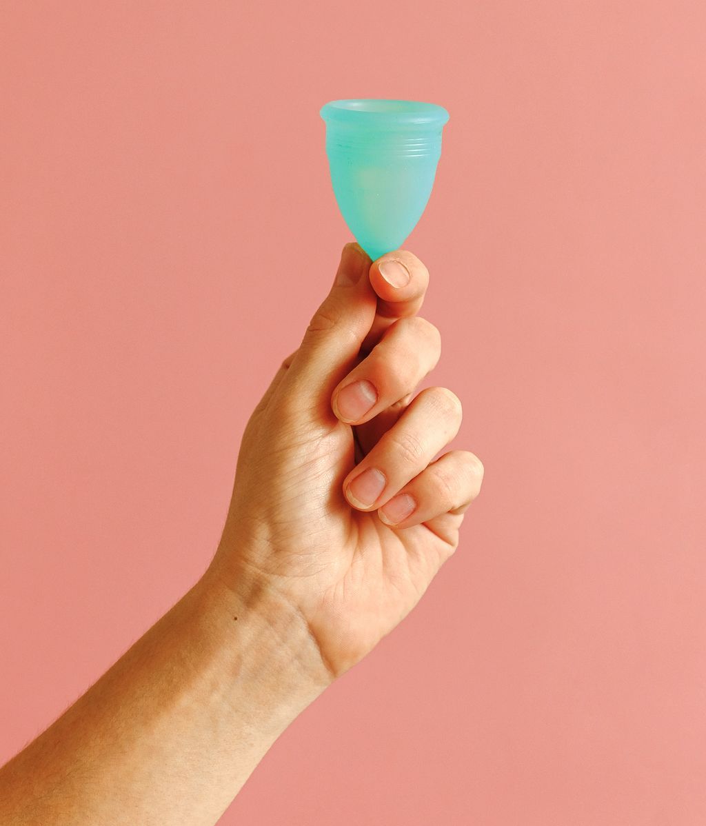 person-holding-menstrual-cup-3683062