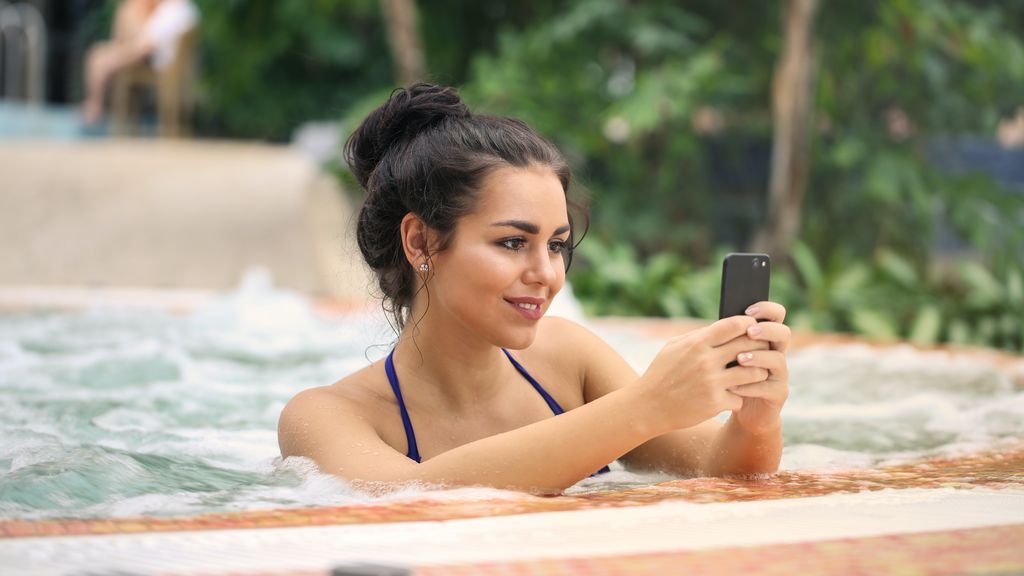 photo-of-a-woman-in-jacuzzi-using-smartphone-3775153