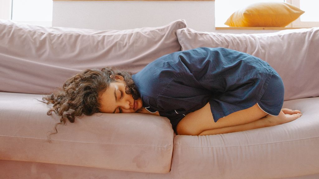 woman-lying-on-couch-3958567