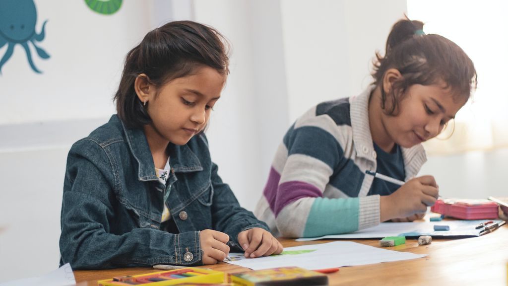 two-girls-doing-school-works-1720186
