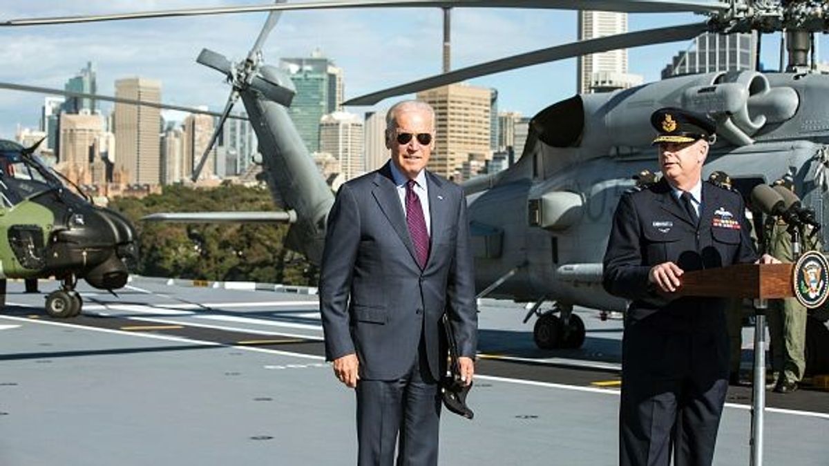 US Vice President Joe Biden (L) is introduced to Australian Defence Force personnel by Air Chief Marshal Mark Binkin, Chief of the Defence Forces (R), on board HMAS Adelaide at the Garden Island Naval Base in Sydney on July 19, 2016. 

Biden is visiting Australia on a four day trip which includes visits to Melbourne and Sydney. / AFP / POOL / Jessica Hromas        (Photo credit should read JESSICA HROMAS/AFP via Getty Images)