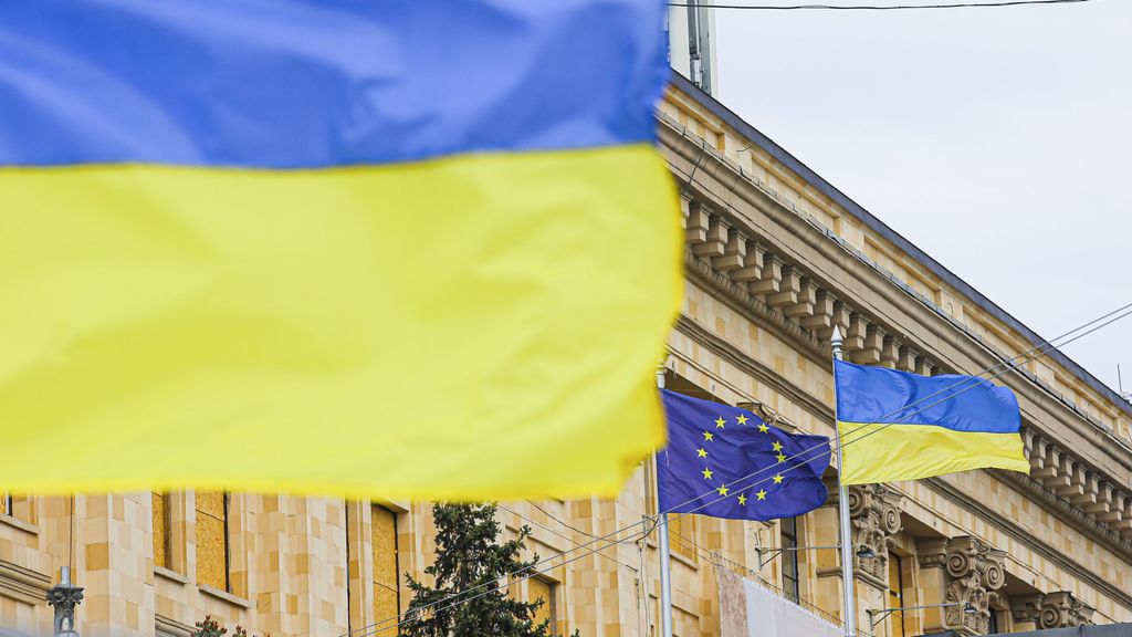 Ukrainian and EU flags in front of the Kharkiv Regional Government headquarters in the center of Kharkiv. Russia invaded Ukraine on 24 February 2022, triggering the largest military attack in Europe since World War II.