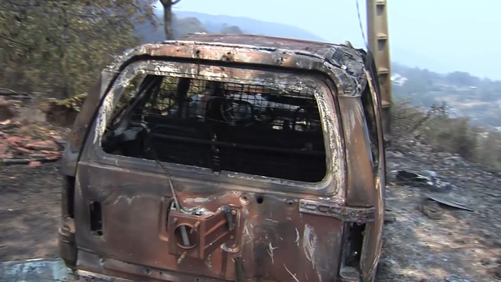 La imagen de la desolación de los pueblos gallegos: coches calcinados, casas destruidas y familias sin hogar