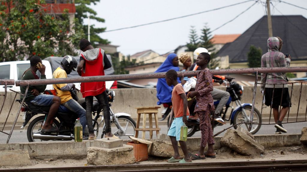 Fuel sales along a road leading to Nigeria-Seme border