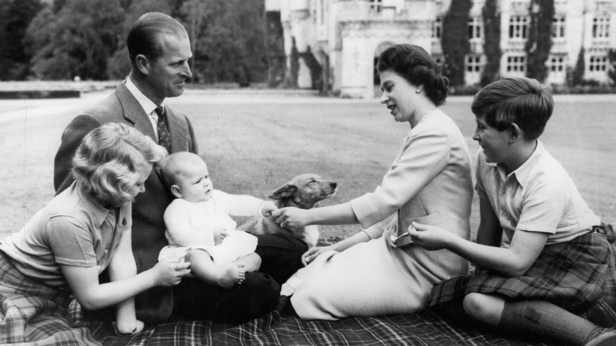 Sept 9, 1960 - Aberdeenshire, Scotland, United Kingdom - Big siblings Prince Charles, right, Princess Anne, left, and parents, Queen Elizabeth and the Duke of Edinburgh dote on baby Prince Andrew with their puppy sitting next to them during family portraits at Balmoral Castle. The Royal family was enjoying their Scottish retreat for a holiday. (Credit Image: © Keystone Pictures USA/ZUMAPRESS.com)