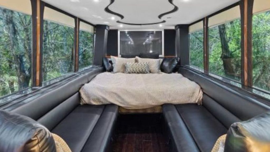La cama Queen Size