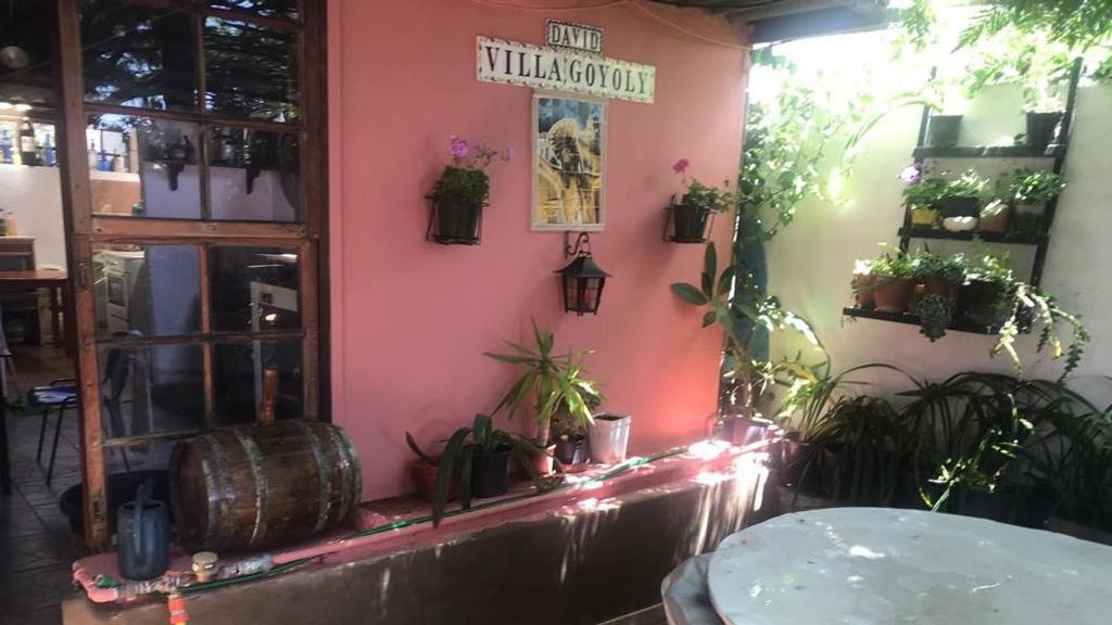 La casa de la familia de Gregorio antes de ser engullida por el volcán