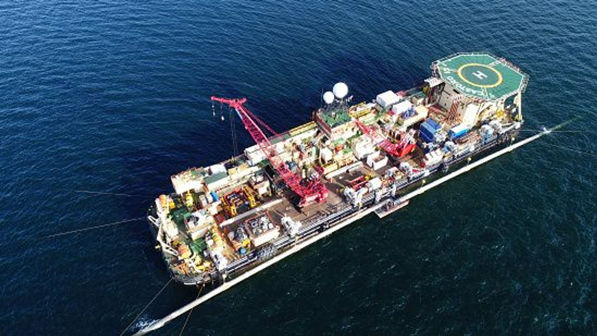 12 August 2019, Mecklenburg-Western Pomerania, Sassnitz: On a platform at the pipeline laying ship "Castoro 10" off the southeast tip of the island of R?gen, experts are working on the connection of two pipeline sections of the Baltic Sea natural gas pipeline Nord Stream 2 (aerial photograph with a drone). The new double line will be laid essentially parallel to the Nord Stream 1 Baltic Sea pipeline, through which gas has been flowing from Russia to Lubmin near Greifswald since 2011. According to the plans, the new pipeline, which will also be 1200 kilometers long, will be ready for operation by the end of the year. Photo: Stefan Sauer/dpa-Zentralbild/dpa (Photo by Stefan Sauer/picture alliance via Getty Images) 12 August 2019, Mecklenburg-Western Pomerania, Sassnitz: On a platform at the pipeline laying ship "Castoro 10" off the southeast tip of the island of R?gen, experts are working on the connection of two pipeline sections of the Baltic Sea natural gas pipeline Nord Stream 2 (aerial photograph with a drone). The new double line will be laid essentially parallel to the Nord Stream 1 Baltic Sea pipeline, through which gas has been flowing from Russia to Lubmin near Greifswald since 2011. According to the plans, the new pipeline, which will also be 1200 kilometers long, will be ready for operation by the end of the year. Photo: Stefan Sauer/dpa-Zentralbild/dpa (Photo by Stefan Sauer/picture alliance via Getty Images)