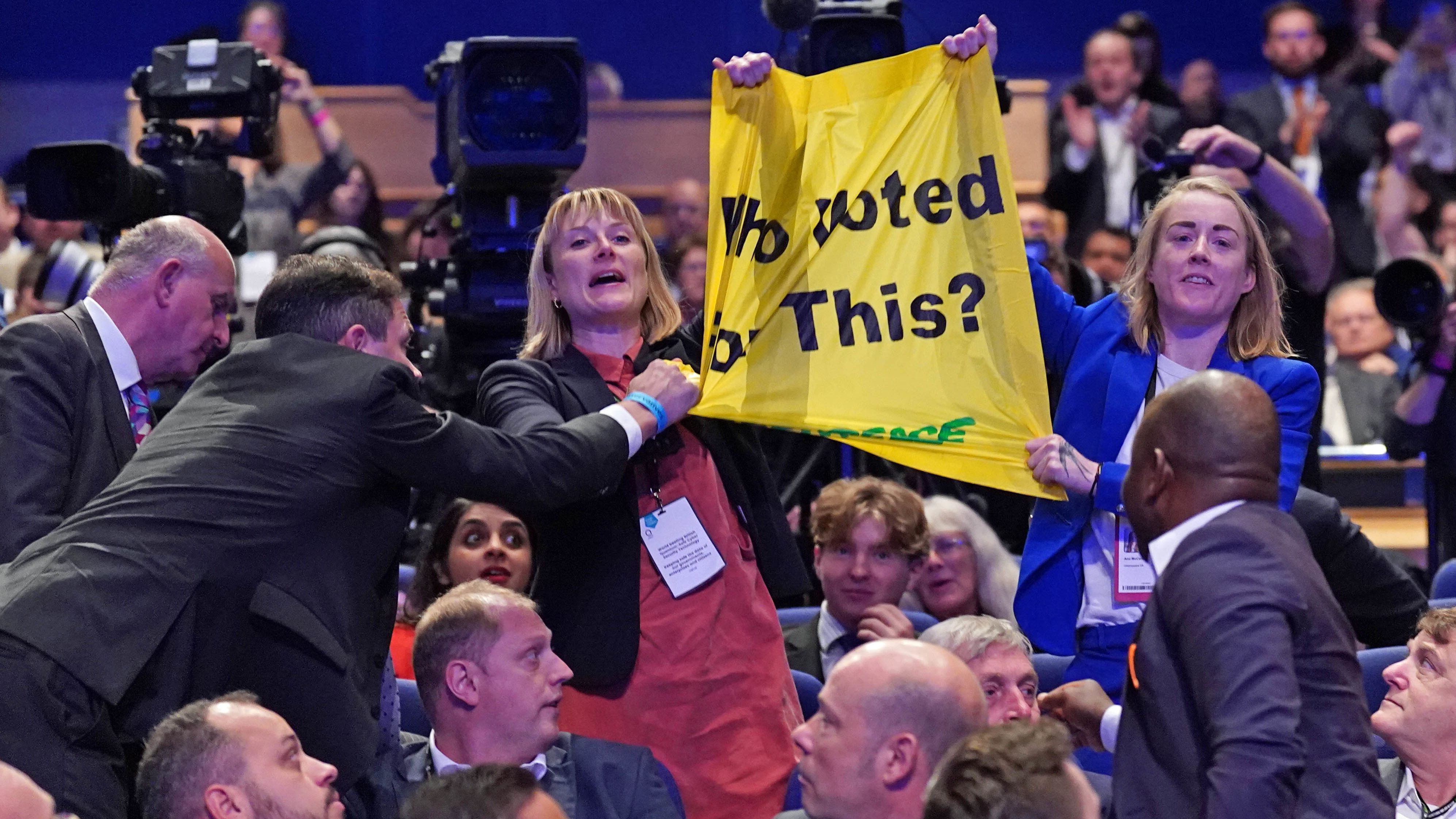 Greenpeace activists interrupt British Prime Minister Truss .’s speech