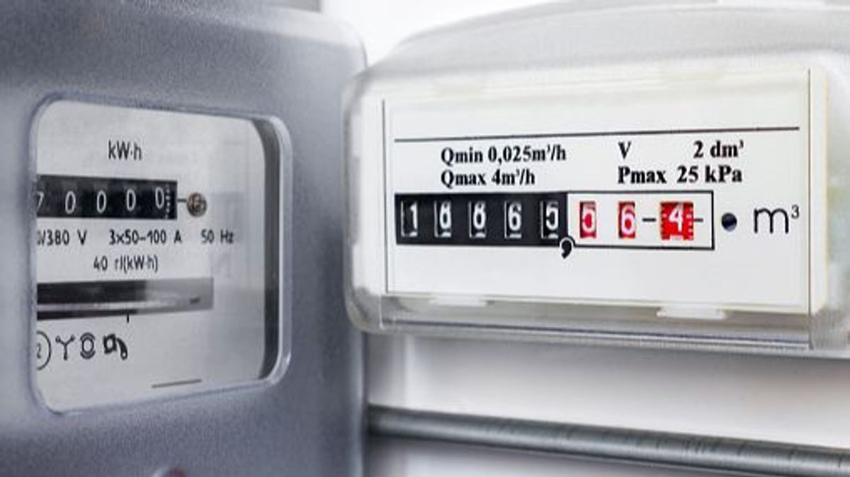 Gas meter and electricity meter. Utility bills, consumption of electricity and gas for heating home, energy costs, symbolic image. Selective focus Gas meter and electricity meter. Utility bills, consumption of electricity and gas for heating home, energy costs, symbolic image. Selective focus