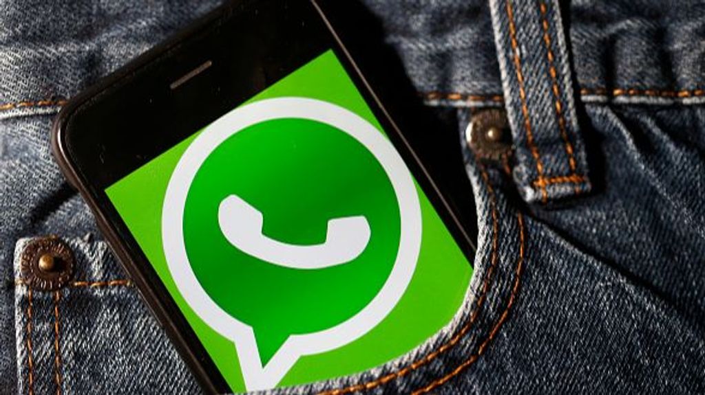 PARIS, FRANCE - NOVEMBER 21: In this photo illustration, the WhatsApp application logo is displayed on the screen of a smartphone on November 21, 2019 in Paris, France. WhatsApp is a multiplatform mobile application that provides an encrypted instant messaging system. (Photo by Chesnot/Getty Images)