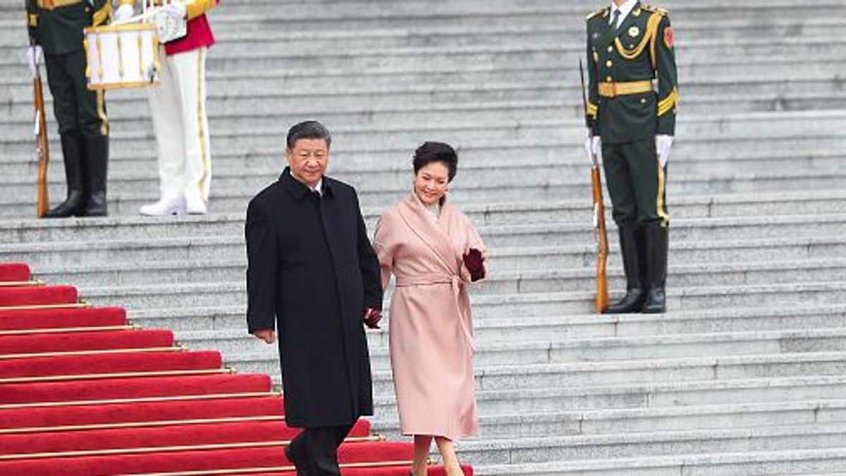 Peng Liyuan, la primera dama de China junto a su marido Xi-Jinping