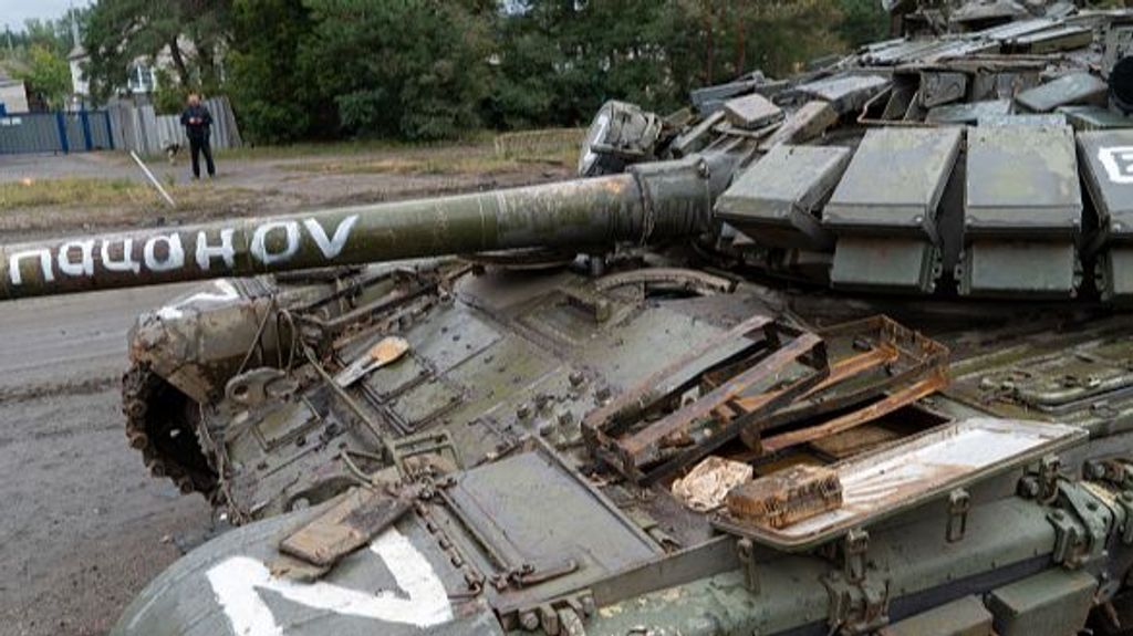 IZIUM, UKRAINE ? SEPTEMBER 14: A damaged Russian tank which was taken as a trophy by the Ukrainian military on September 14, 2022 in Izium Ukraine. Almost 70% of high-rise buildings in Izium, Kharkiv Oblast were damaged, according to local authorities. Gas, electricity and water are currently missing in most areas of the city. Communal communities and rescuers are working on restoration. Locals began to go to the city center after Ukrainian military begun patrolling the streets and reported that it was safe to be in the city. (Photo by Viacheslav Mavrychev/Suspilne Ukraine/JSC "UA:PBC"/Global Images Ukraine via Getty Images)