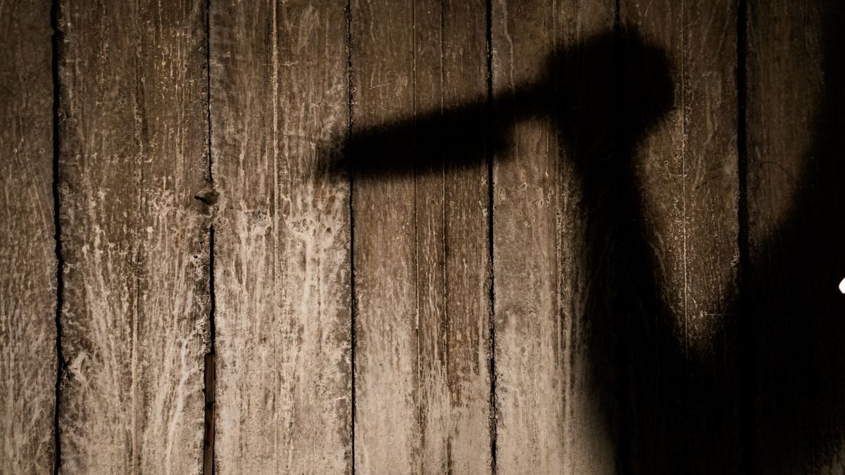 Imagen de archivo de una sombra con un cuchillo