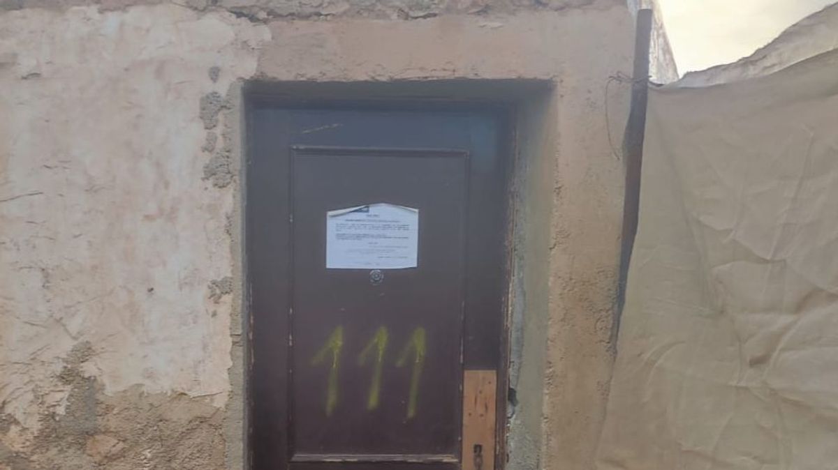 Notificación en una de las chabolas en el asentamiento El wilili