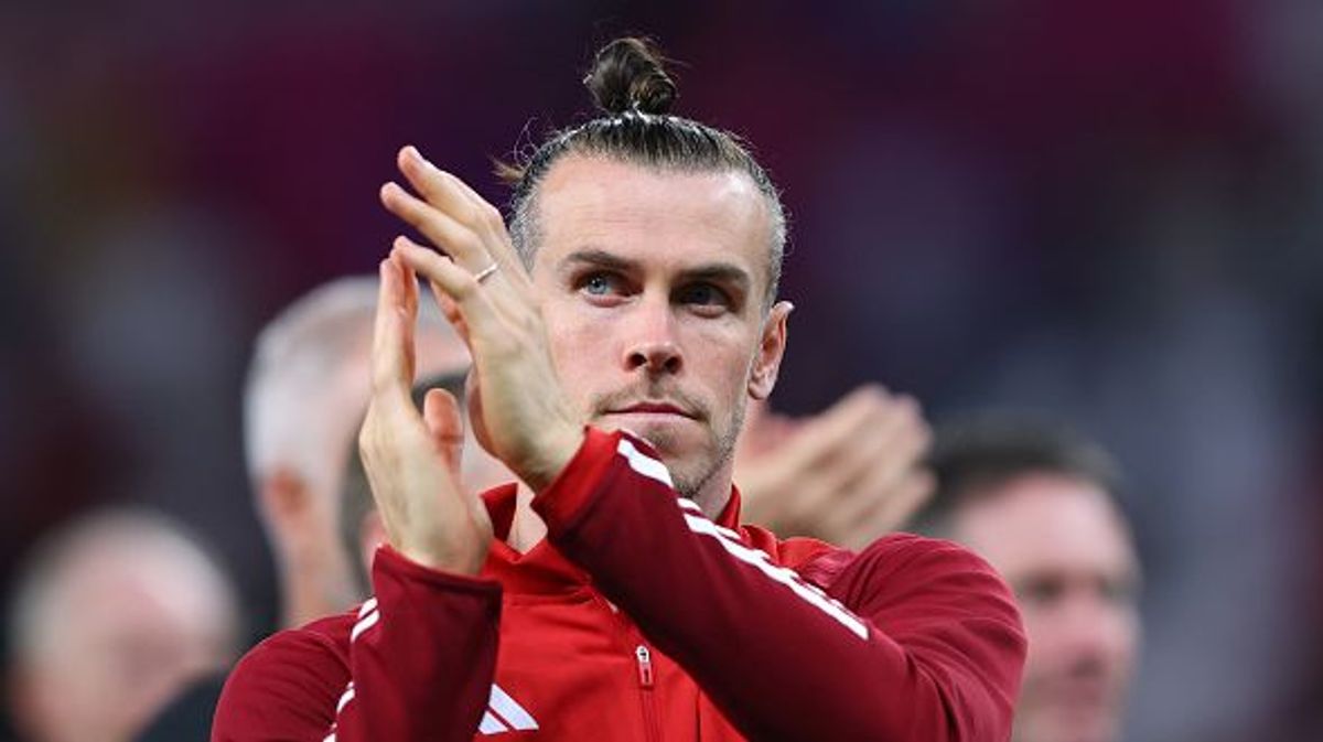DOHA, QATAR - NOVEMBER 29:  Gareth Bale of Wales looks dejected as he applauds the fans during the FIFA World Cup Qatar 2022 Group B match between Wales and England at Ahmad Bin Ali Stadium on November 29, 2022 in Doha, Qatar. (Photo by Marc Atkins/Getty Images)