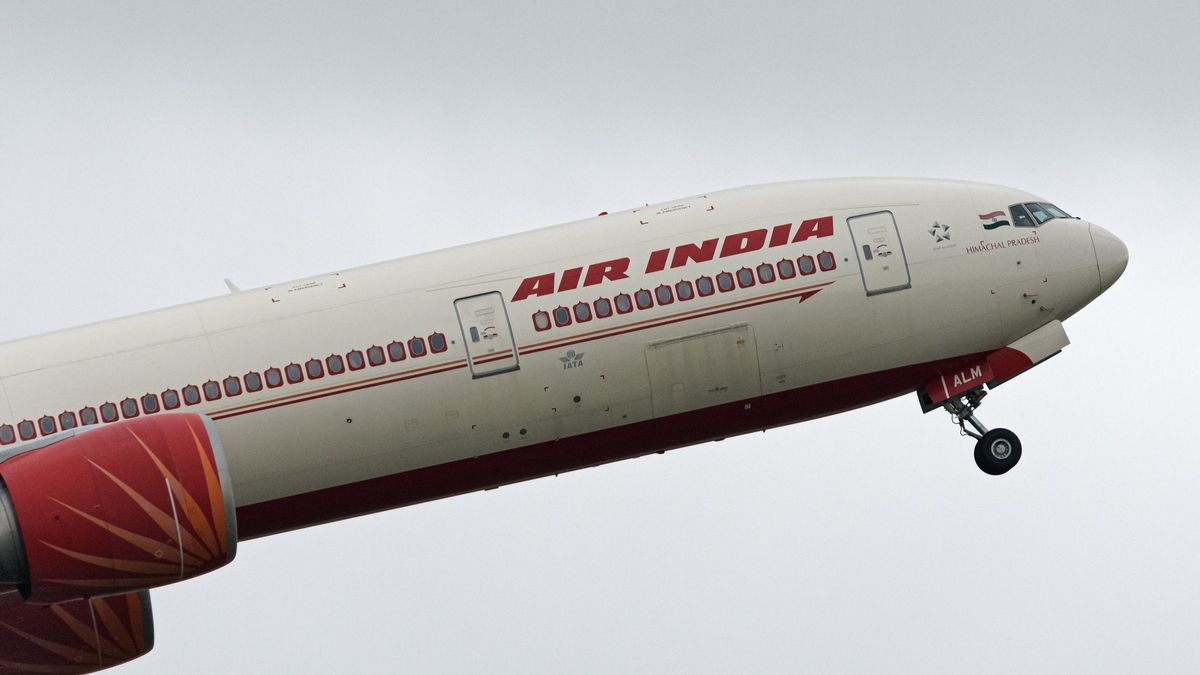 An Air India Boeing 777-300ER jet (VT-ALM) takes off from Vancouver International Airport.