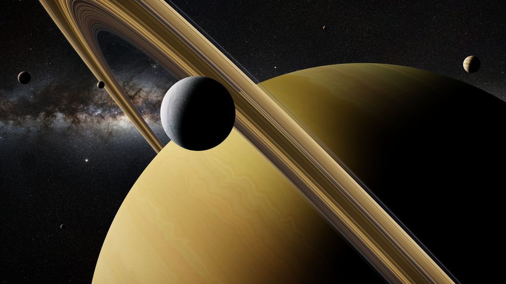 Representación de Saturno y sus lunas