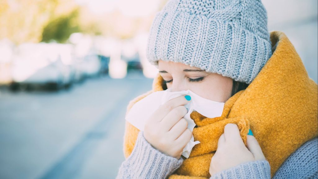 Mujer con síntomas de infección respiratoria