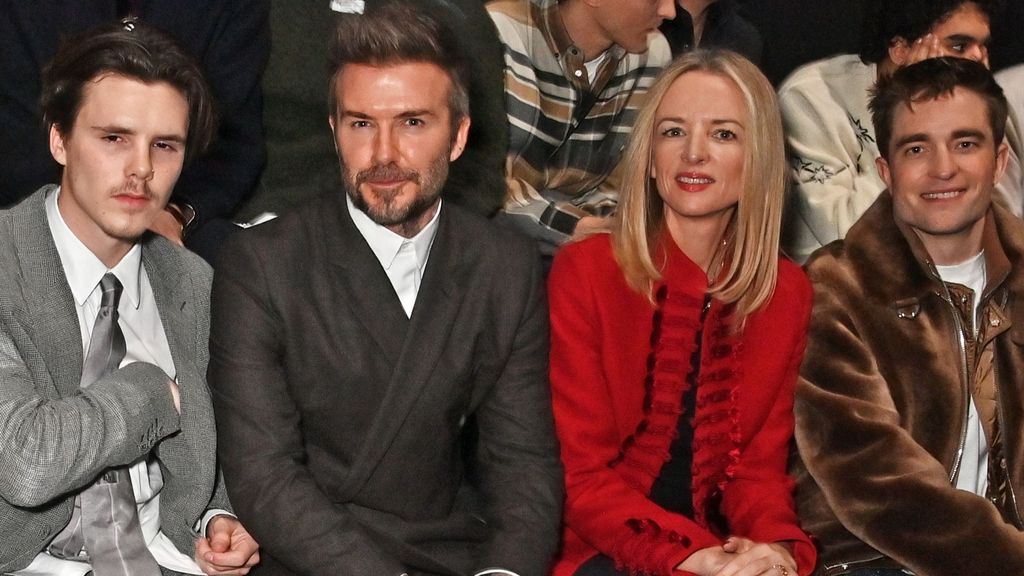 Delphine Arnault con David Beckham en el desfile de Dior