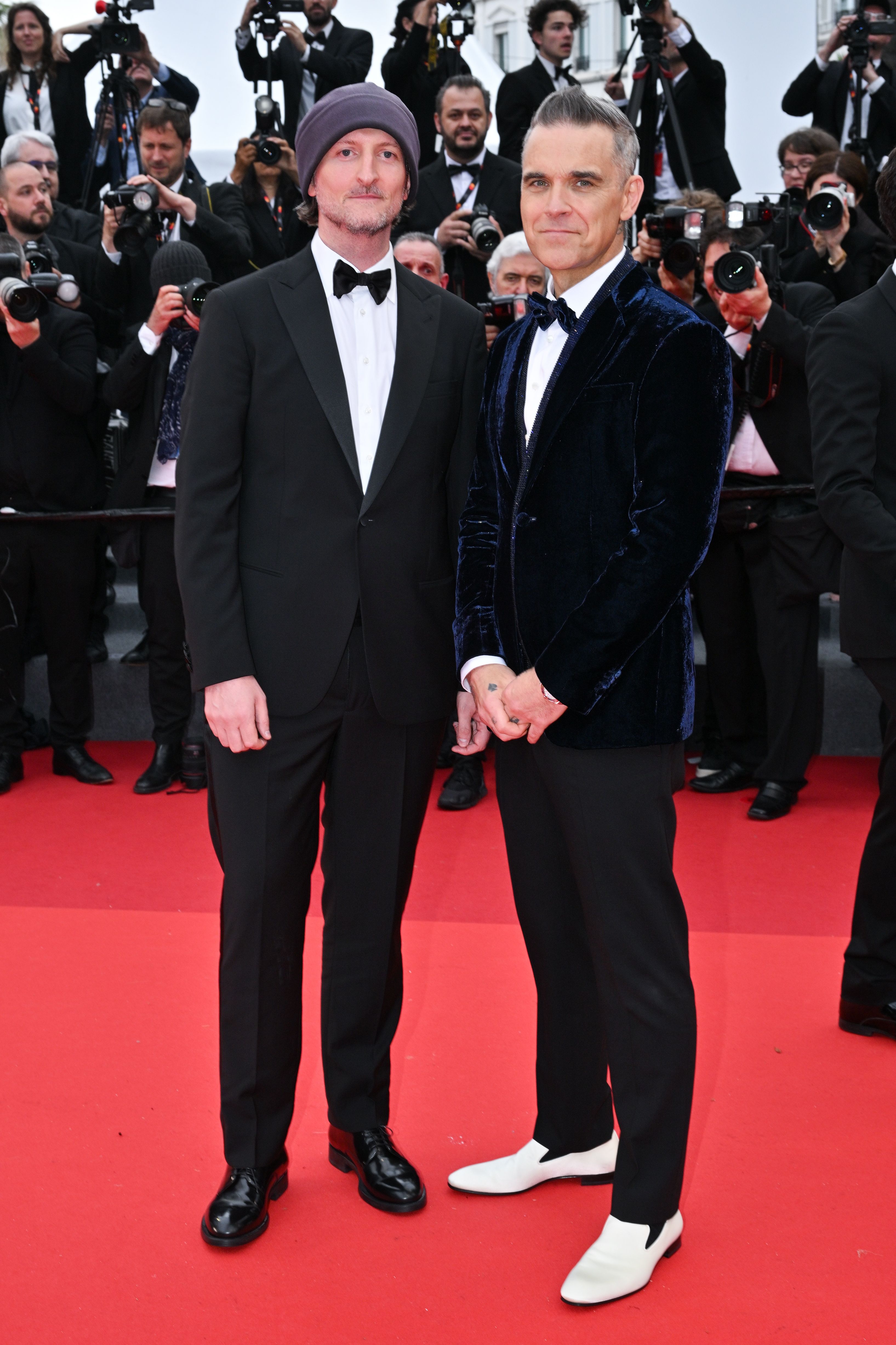 Robbie Williams y Michael Gracey