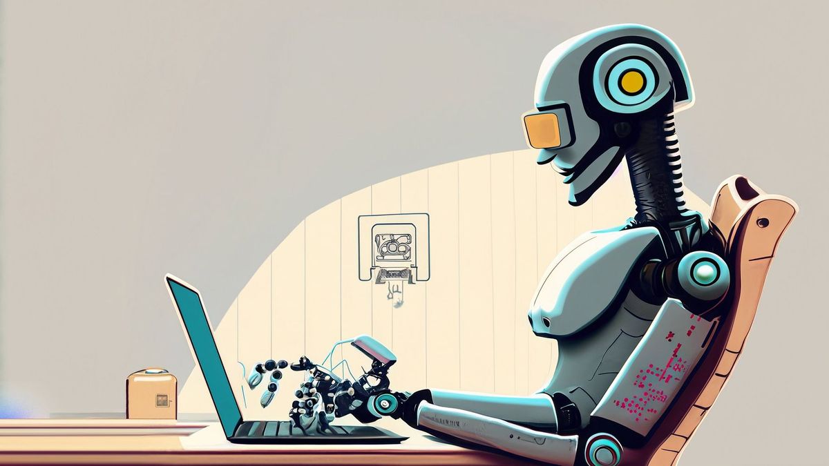 Robot escribiendo en un ordenador portátl