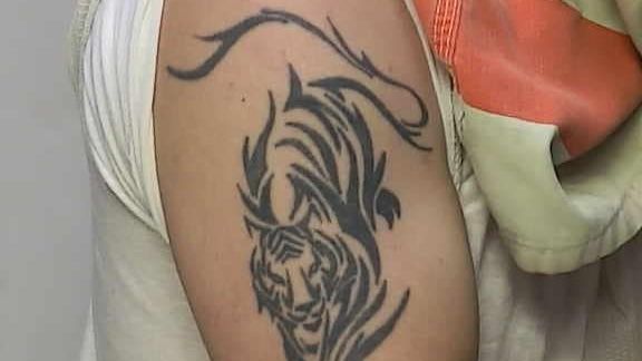 Michael Charles Burham y sus tatuajes