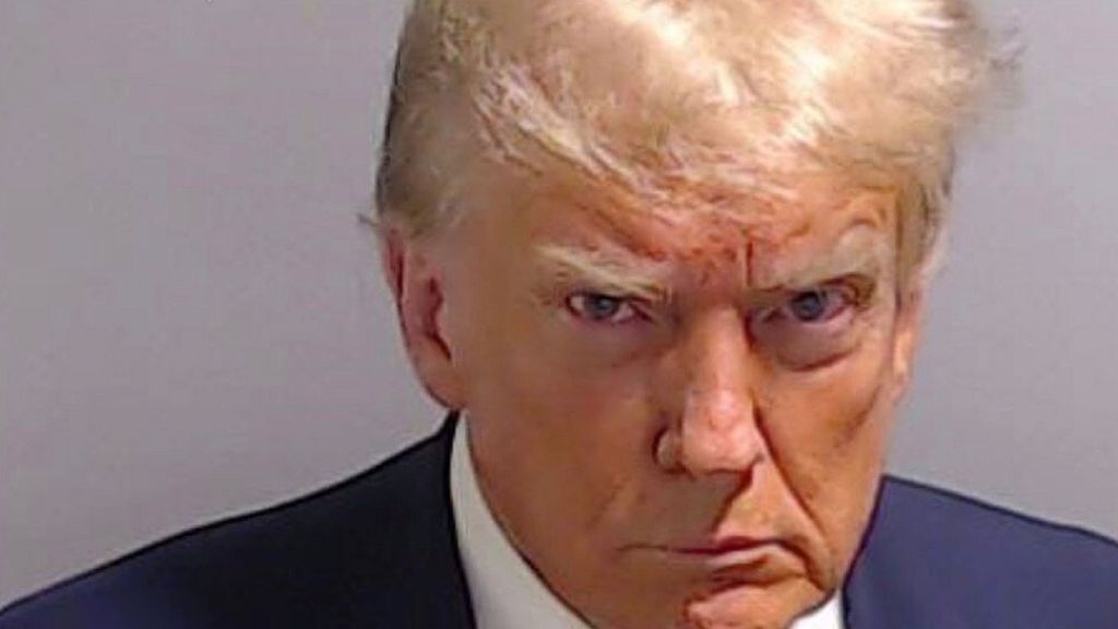 August 24, 2023, Atlanta, Georgia, USA: Booking photo of Former American President DONALD JOHN TRUMP, 77, at Fulton County Jail. Trump indicted by a Fulton County Grand Jury August 14th for 2020 election interference. Lawyers negotiated a $200,000 bond before he turned himself in. The mug shot is a historic first for any US President. 18 others were indicted on alleged attempts to overturn the Georgia 2020 election results. 4th criminal case to be leveled against Trump this year. Result of an elected Democrat Fulton County District Attorney Willis, 2 year long investigation. 41 charges were filed against 19 individuals. Prosecuting under Georgias anti-racketeering law for conspiring to nullify the election. (Credit Image: © Fulton County Sheriff's Office via ZUMA Press Wire)