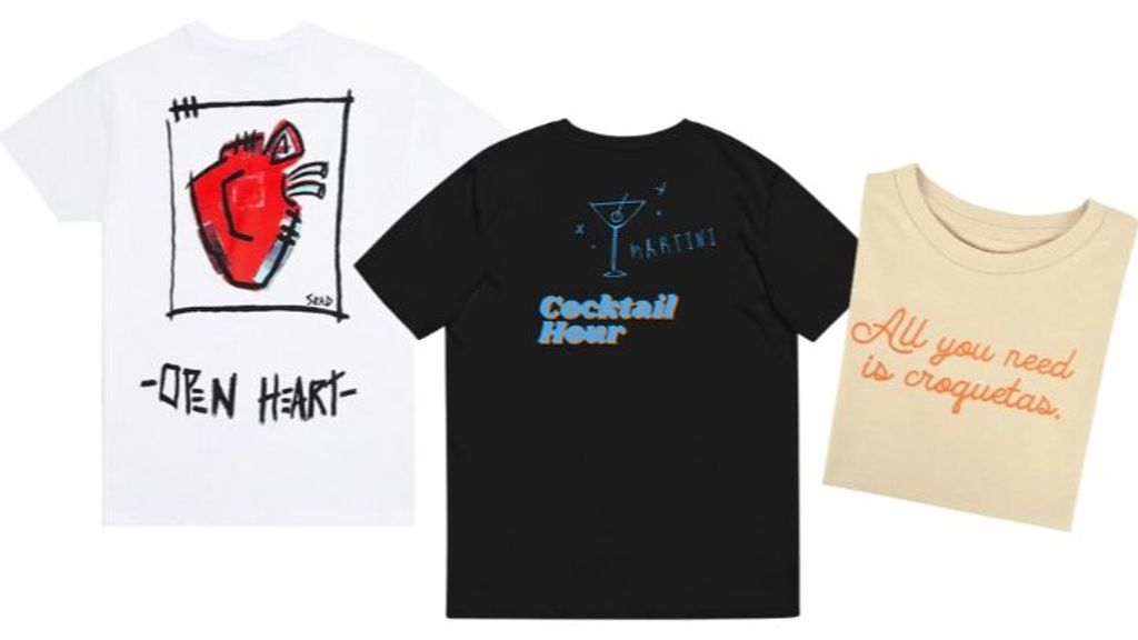 De izquierda a derecha: Camiseta ‘Open Heart’ de la Colección de la artista madrileña Sra.D x Morrison (26€). Camiseta ‘Cocktail Hour’, modelo Martini, de The Good Life (45€). Camiseta con ‘All you need is croquetas’ bordado, de Superbritánico (29€).