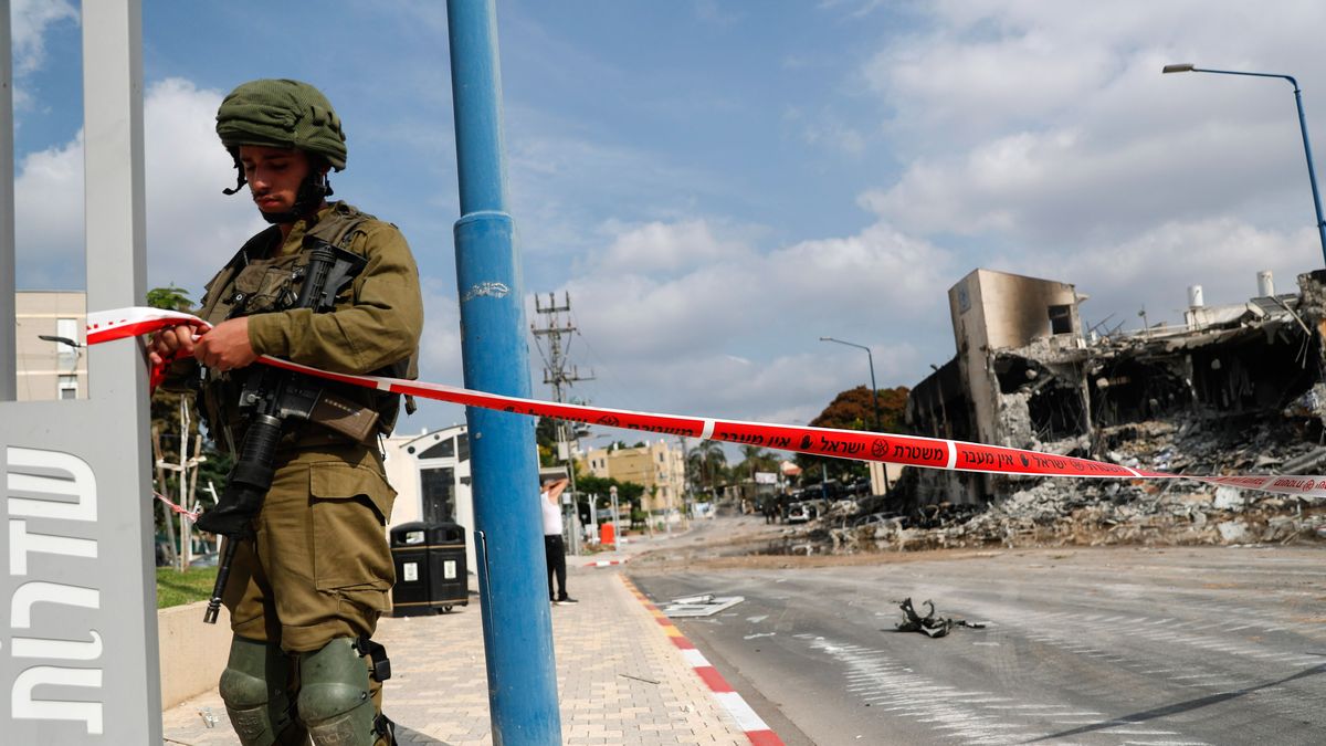 Israeli forces patrol the area near destroyed police station in Sderot