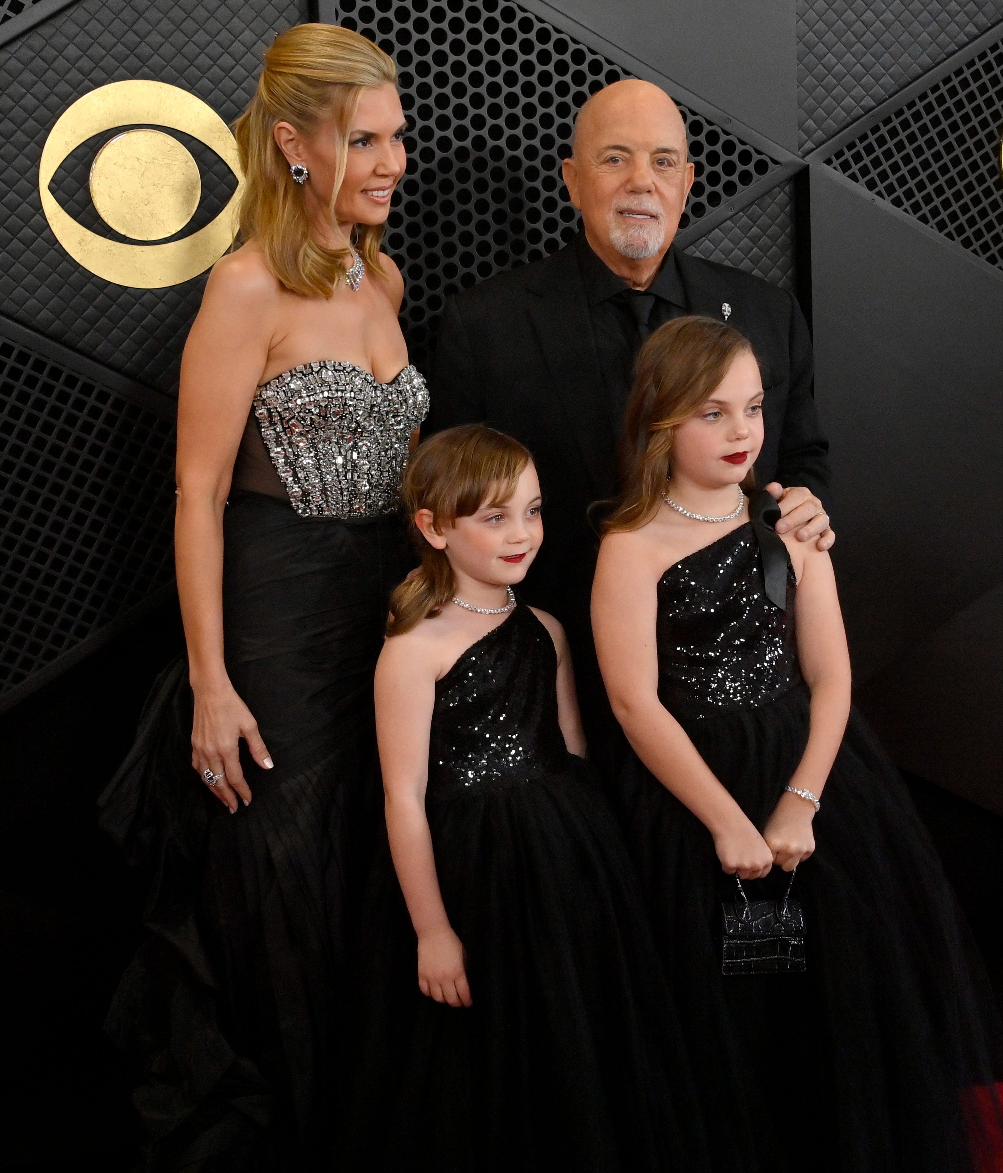 Alexis Roderick, Della Rose Joel, Billy Joel, y Remy Anne Joel