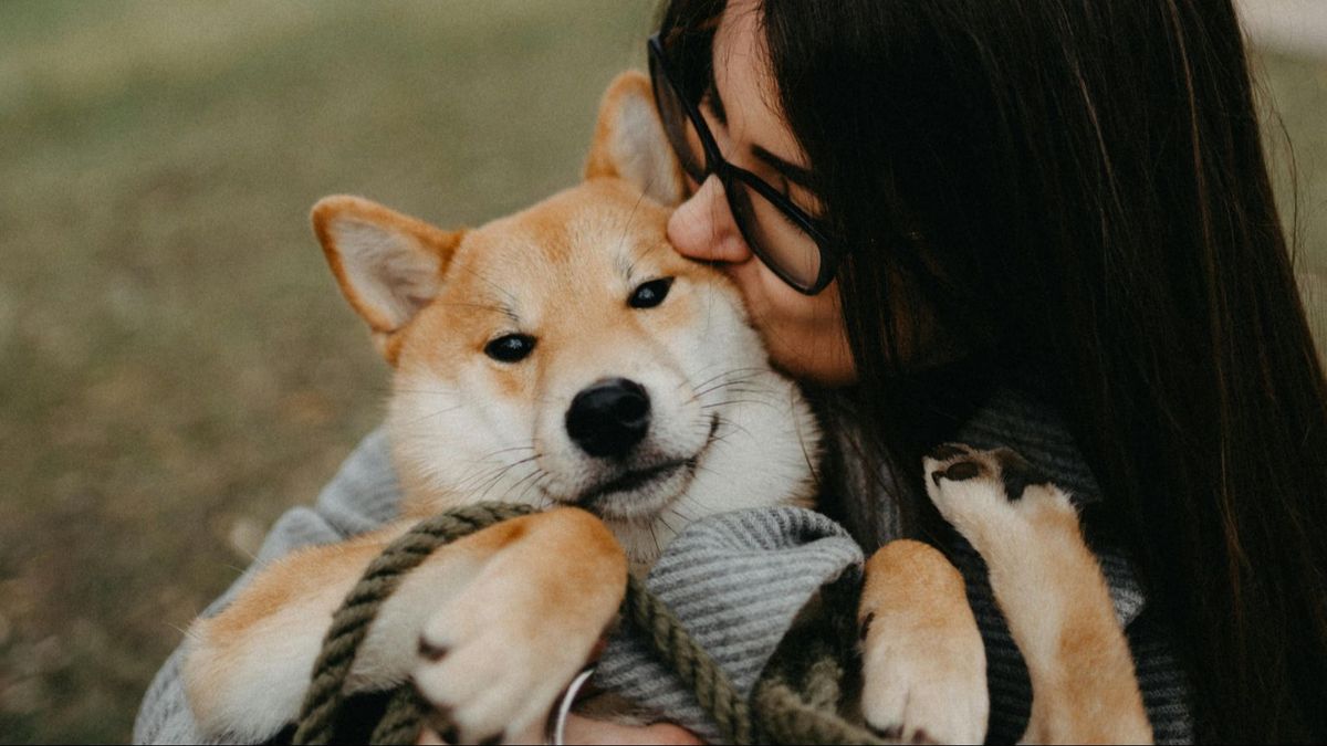 Un perro y su dueña