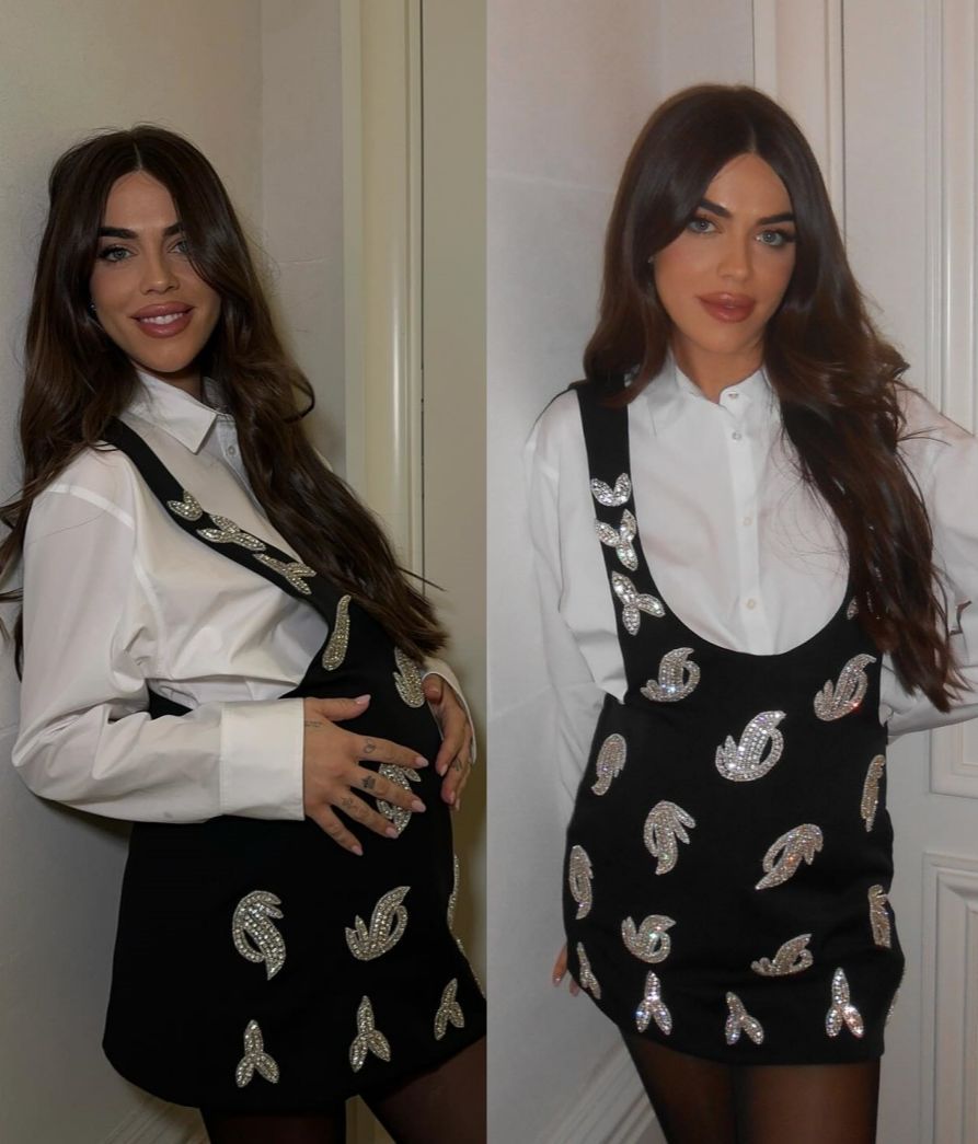 Violeta, embarazada, con el mismo vestido