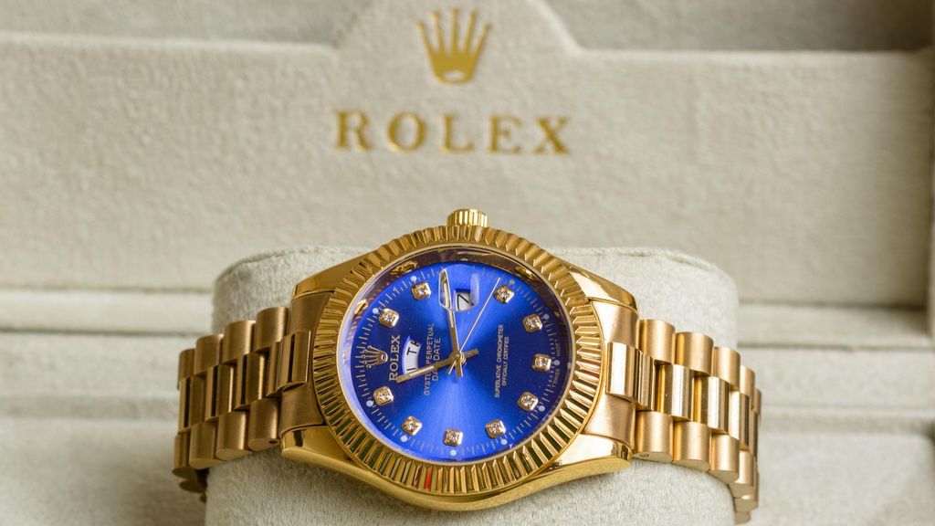 Reloj de la marca Rolex, de color dorado