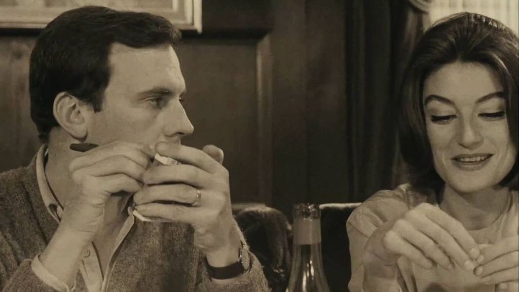 Junto a Jean-Louis Tringtinat en 'Un homme et une femme' (1966).